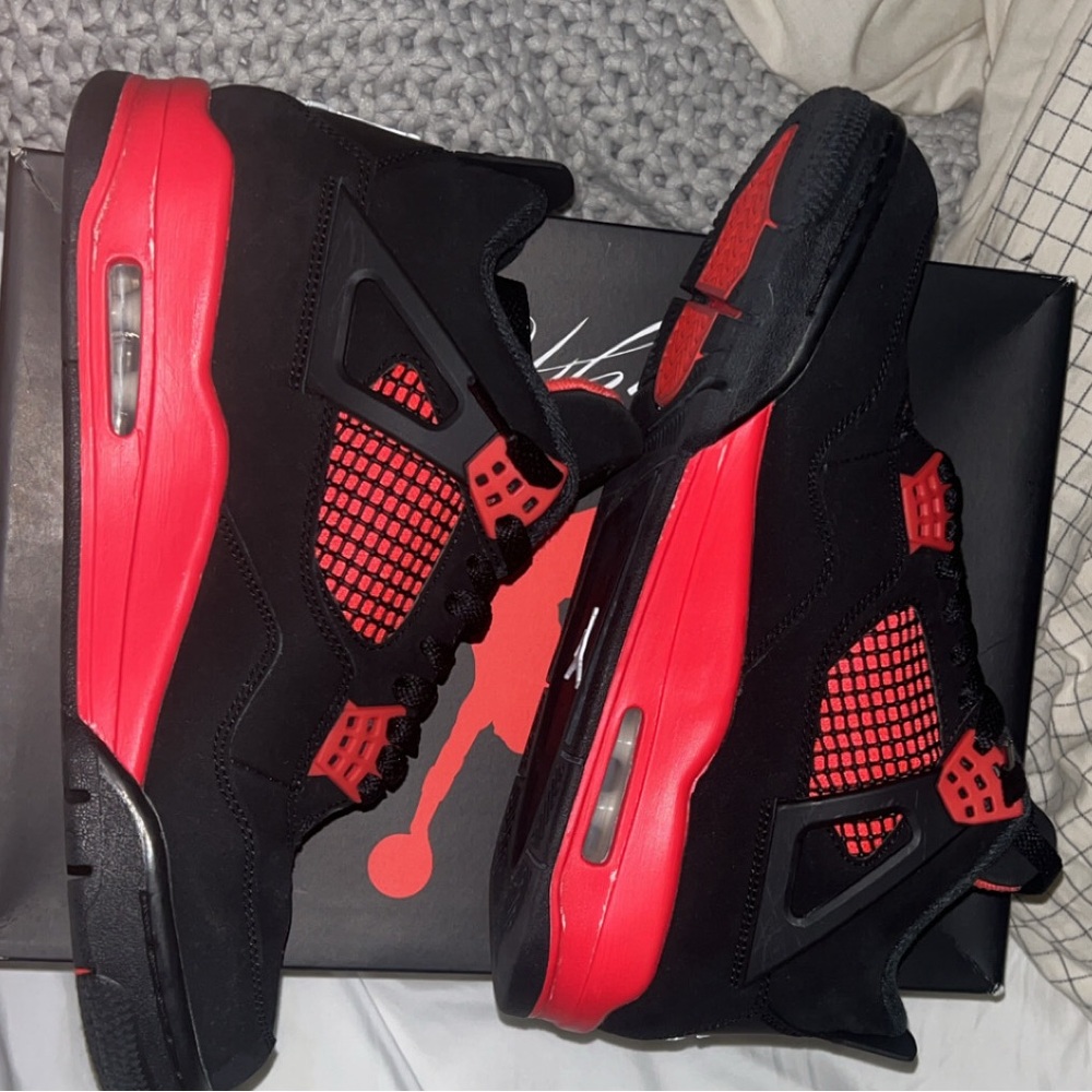 Jordan 4 red thunders gently worn
